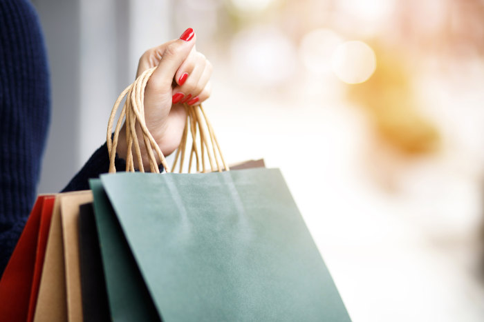 woman-holding-shopping-bags
