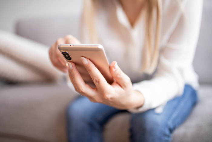 woman-holding-a-smartphone