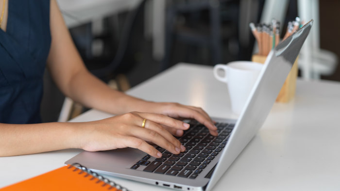 woman-typing-on-laptop