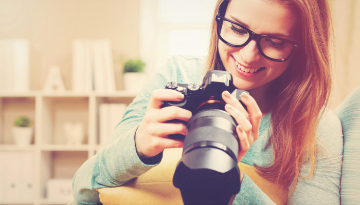 smiling-woman-taking-pictures