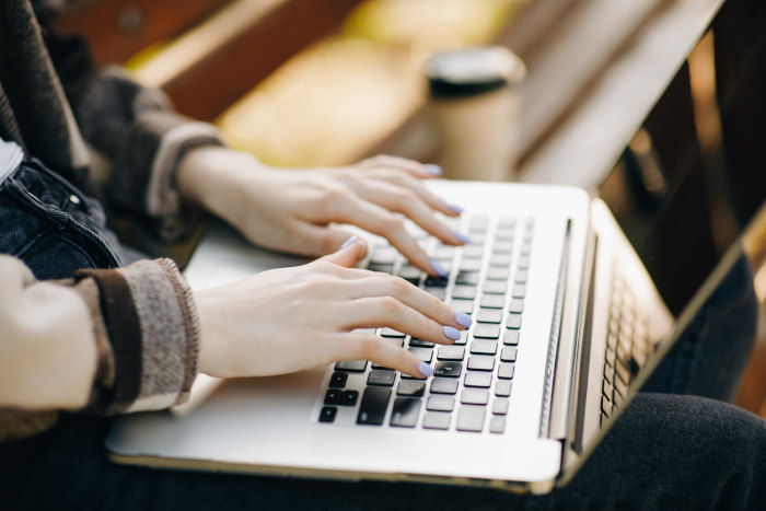 woman-hands-on-laptop